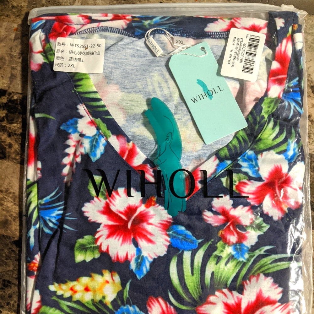 Womans Beautiful Never worn packaged Wiholl Flower Dress.